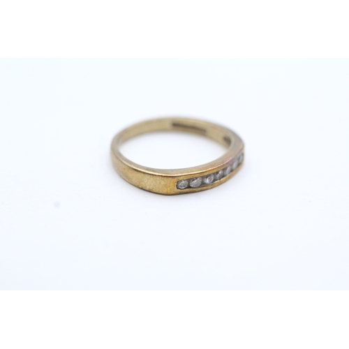 165 - 9ct gold diamond channel setting ring (1.8g) Size O 1/2