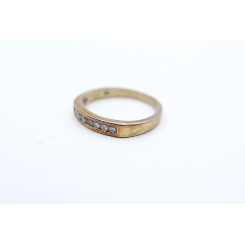 165 - 9ct gold diamond channel setting ring (1.8g) Size O 1/2