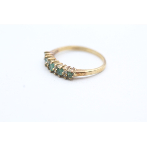 166 - 9ct gold diamond and emerald row ring (1.8g) Size N 1/2