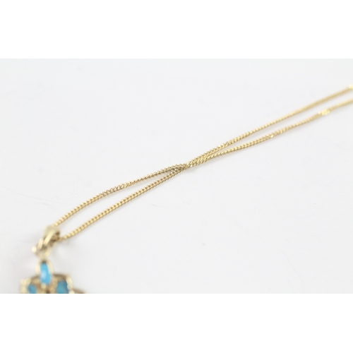 172 - 9ct gold diamond and blue gemstone pendant on chain