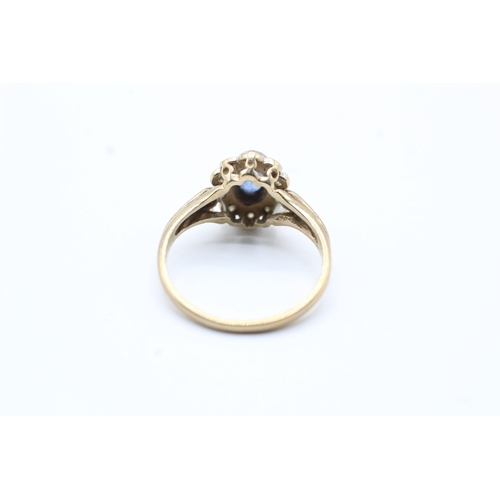 173 - 9ct gold blue gemstone and diamond halo set ring (1.9g) Size K 1/2