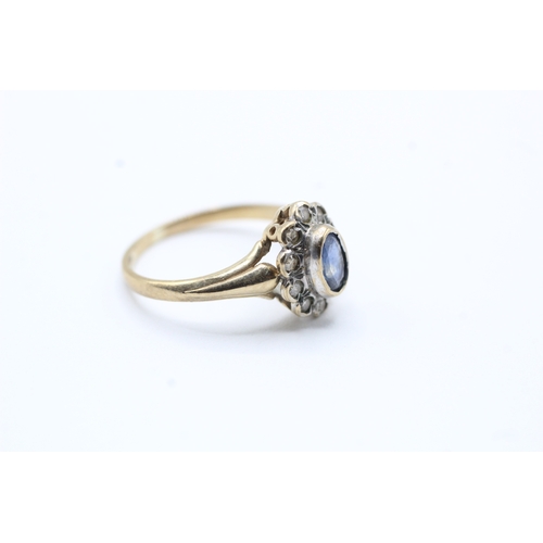 173 - 9ct gold blue gemstone and diamond halo set ring (1.9g) Size K 1/2