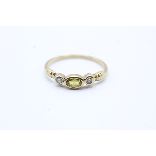 174 - 9ct gold yellow gemstone and diamond ring (1.3g) Size N