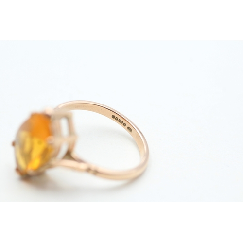 19 - 9ct gold fancy cut orange gemstone dress ring (3.3g) Size P