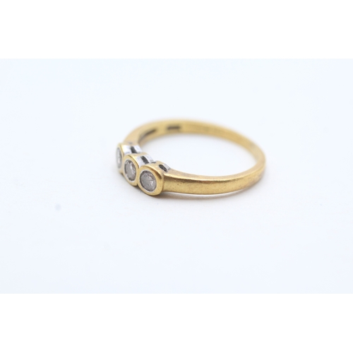 26 - 18ct gold bezel set diamond trilogy ring (2.5g) Size L