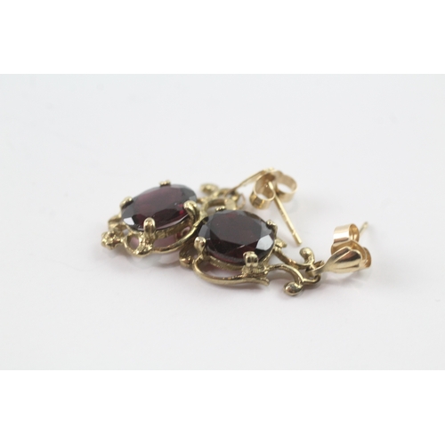 29 - 9ct gold garnet drop stud earrings