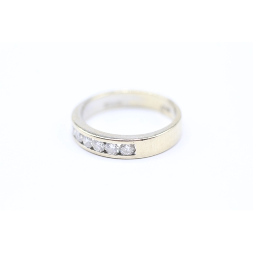 41 - 18ct gold diamond half eternity ring (4.3g) Size O