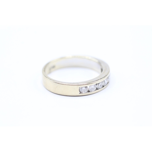 41 - 18ct gold diamond half eternity ring (4.3g) Size O