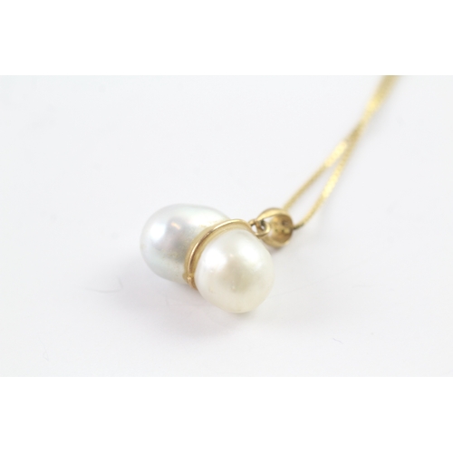 56 - 9ct gold pearl pendant on chain