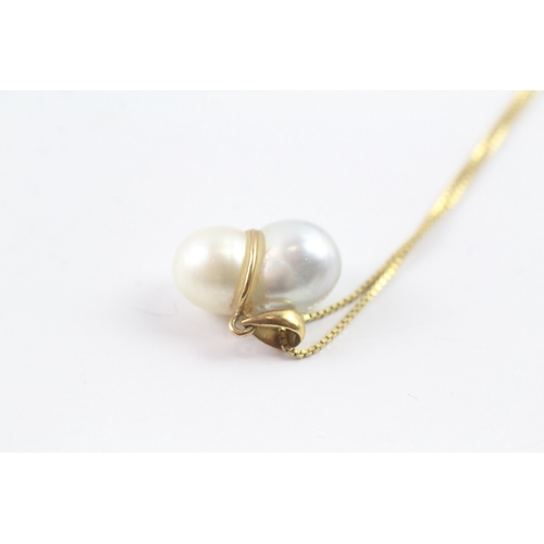 56 - 9ct gold pearl pendant on chain