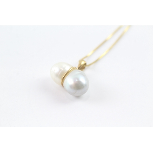 56 - 9ct gold pearl pendant on chain