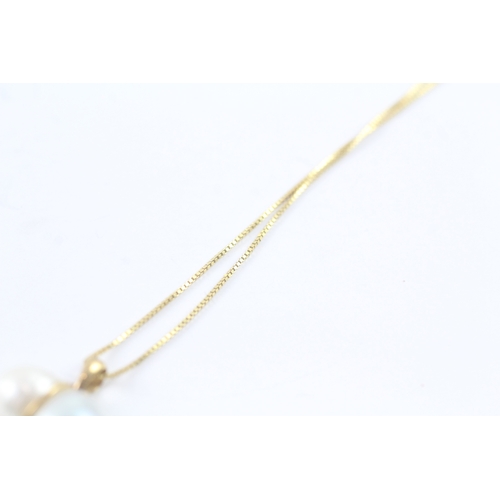 56 - 9ct gold pearl pendant on chain