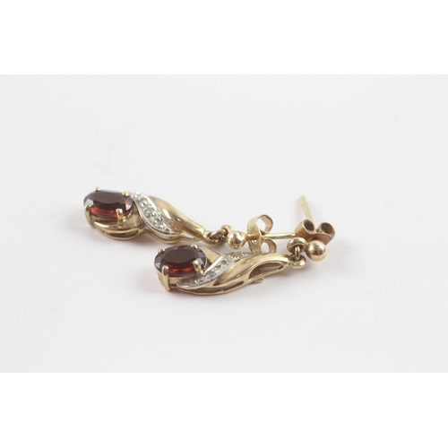 57 - 9ct gold garnet and diamond drop stud earrings