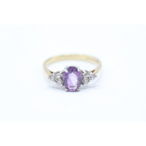 59 - 9ct gold amethyst & cubic zirconia dress ring (2g) Size O