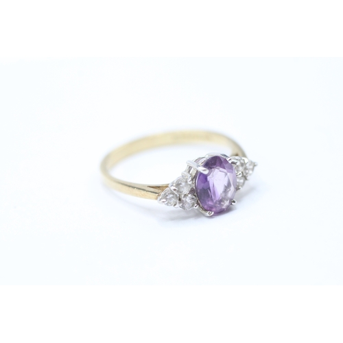 59 - 9ct gold amethyst & cubic zirconia dress ring (2g) Size O