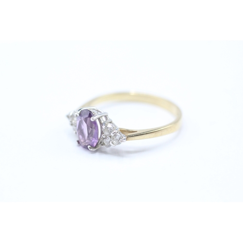 59 - 9ct gold amethyst & cubic zirconia dress ring (2g) Size O