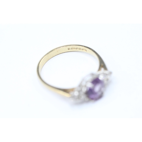 59 - 9ct gold amethyst & cubic zirconia dress ring (2g) Size O