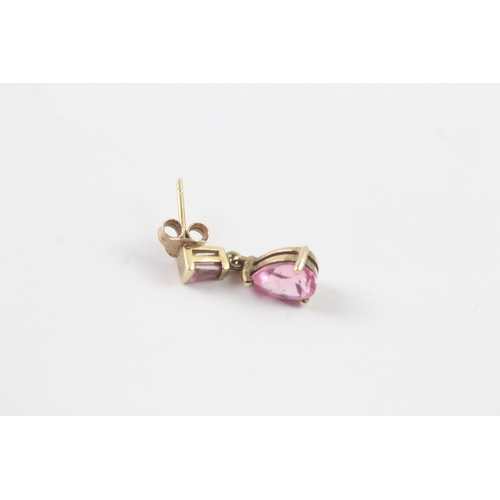 63 - 9ct gold pink gemstone drop stud earrings