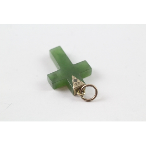 64 - 9ct gold nephrite cross pendant