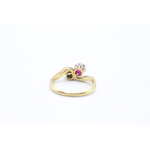 66 - 18ct gold diamond & synthetic ruby toi et moi ring (2.2g) Size G