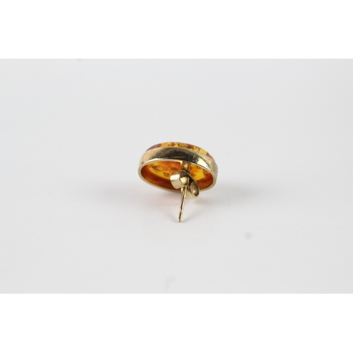 7 - 9ct gold and amber cabochon stud earrings