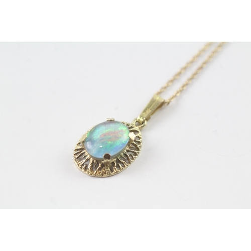 74 - 9ct gold opal triplet pendant on chain