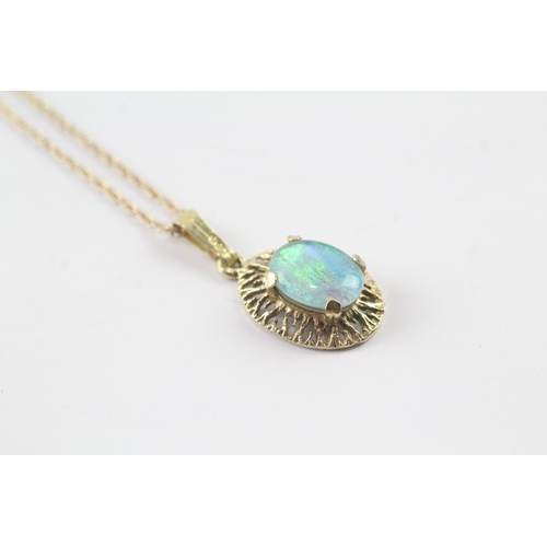 74 - 9ct gold opal triplet pendant on chain