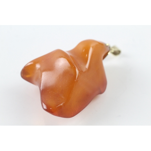 76 - 14ct gold natural large amber pendant