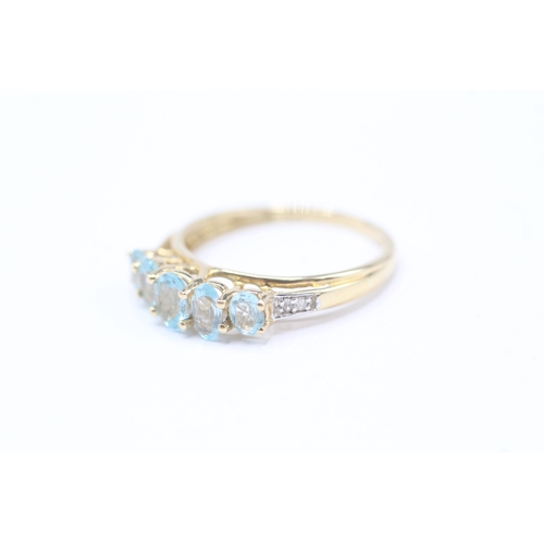 82 - 14ct gold blue gemstone & diamond dress ring (2.2g) Size N