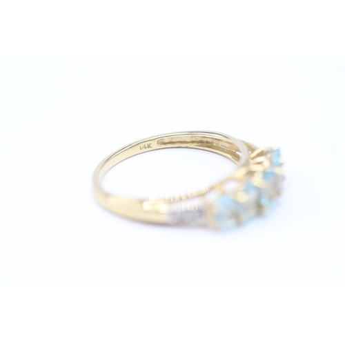 82 - 14ct gold blue gemstone & diamond dress ring (2.2g) Size N