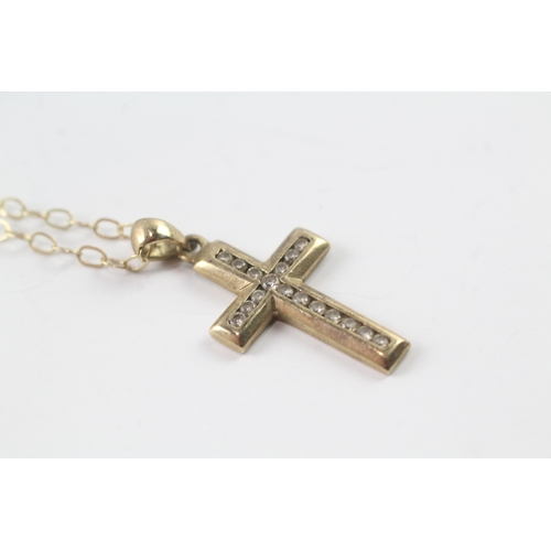 84 - 9ct gold diamond cross pendant on chain