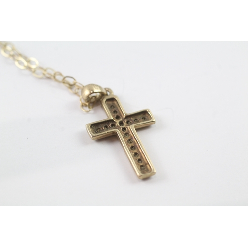 84 - 9ct gold diamond cross pendant on chain