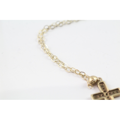 84 - 9ct gold diamond cross pendant on chain