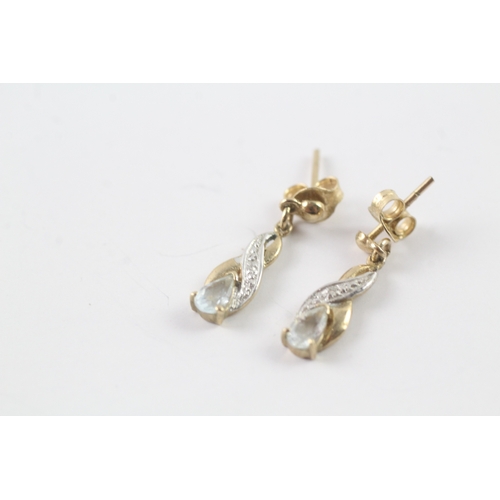 85 - 9ct gold diamond and topaz drop earrings