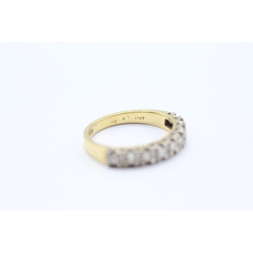 89 - 18ct gold diamond set half hoop eternity ring (3.1g) Size K