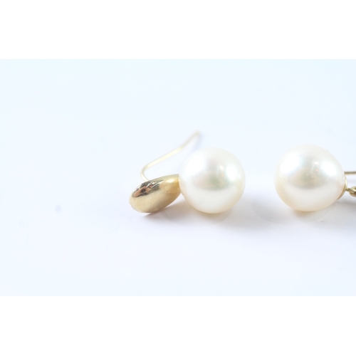 94 - 2x 14ct gold cultured pearl & diamond earrings (3.9g)