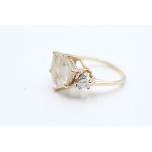 96 - 9ct gold rutilated quartz & white gemstone dress ring (3.4g)