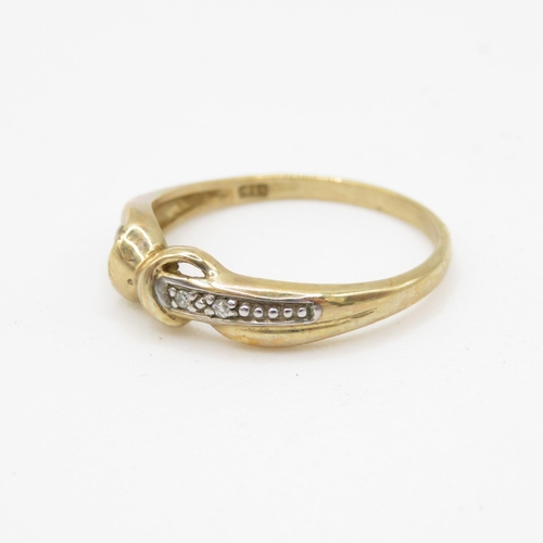 185 - 9ct gold diamond wrap ring (1.6g) Size N