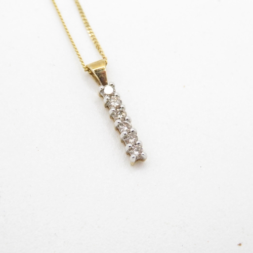 38 - 9ct gold and diamond pendant necklace (1.2g)