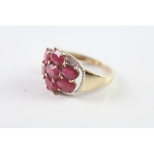 127 - 9ct gold diamond and ruby dress ring Size N