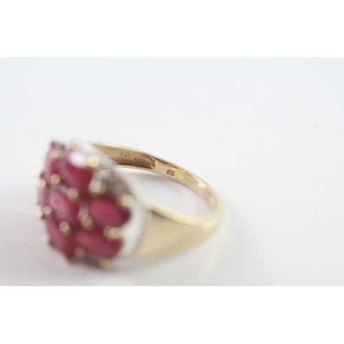 127 - 9ct gold diamond and ruby dress ring Size N