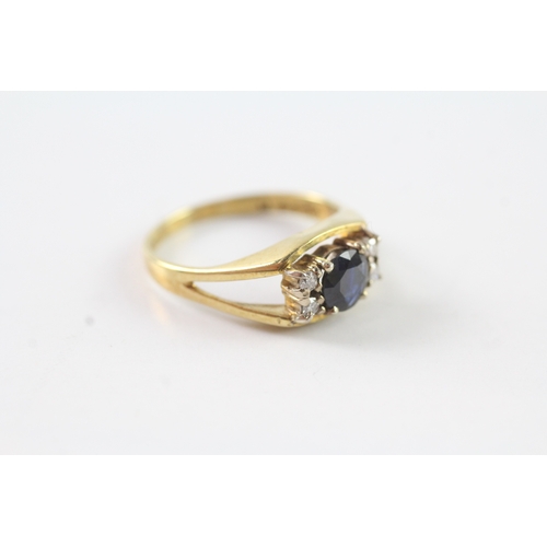 129 - 18ct gold sapphire and diamond dress ring w/ split shoulders Size L