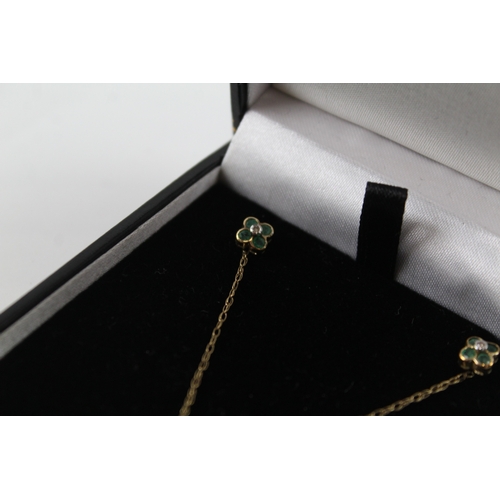 13 - 9ct gold emerald and diamond earrings and necklace set in box (2.2g)