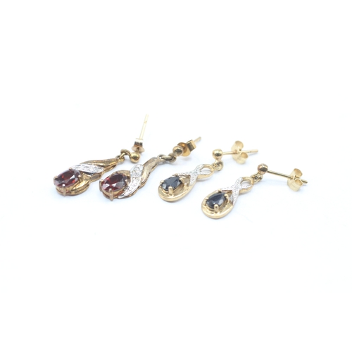 132 - 2 x 9ct gold diamond, sapphire and garnet drop earrings (3g)