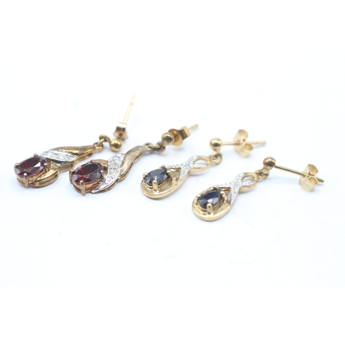 132 - 2 x 9ct gold diamond, sapphire and garnet drop earrings (3g)