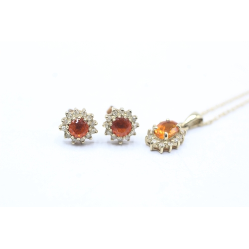 138 - 9ct gold fire opal and diamond halo earring and necklace set (2.1g)