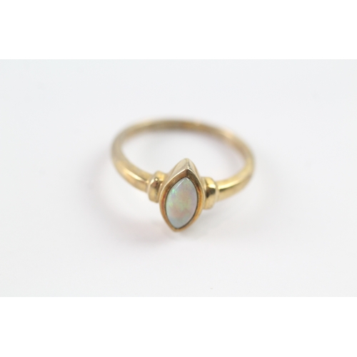 141 - 9ct gold marquise opal dress ring Size N