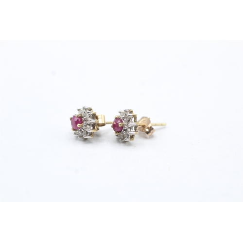 147 - 2 x 9ct gold emerald, ruby and diamond halo stud earrings (2.3g)