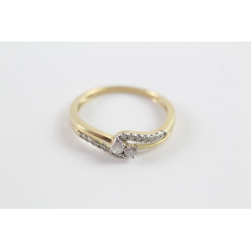 151 - 9ct gold diamond bypass dress ring w/ diamond set shoulders Size M