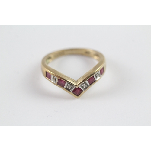 153 - 9ct gold ruby and diamond wishbone dress ring Size M